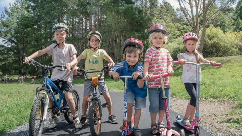 Kids on bikes and scooters