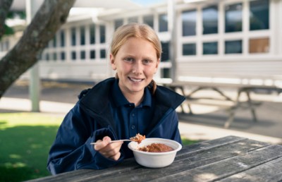 KidsCan child eating breakfast