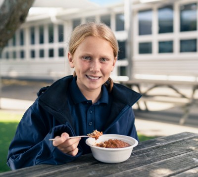 KidsCan child eating breakfast