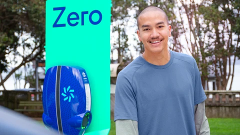 A man next to a Zero AC charger