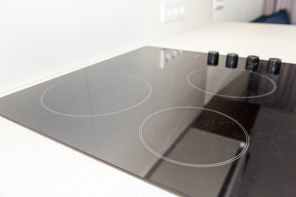 Macro closeup of modern luxury electric cook stove top stovetop cooktop