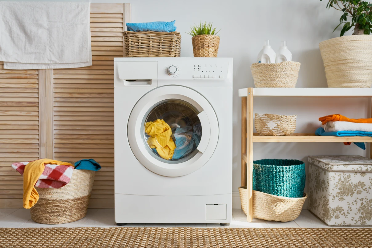 Laundry room with a washing machine at home
